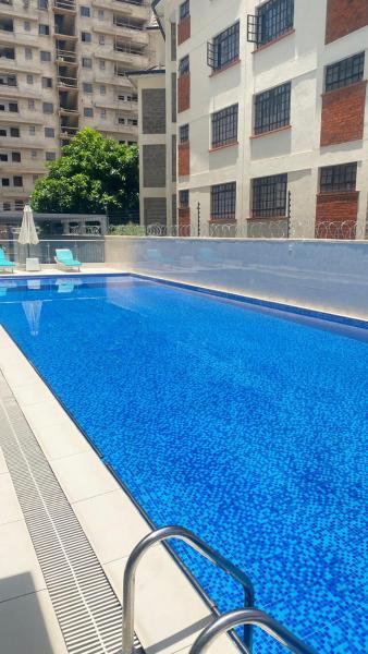 The executive cozy corner apartments with breathtaking city views ,rooftop chill spot area,heated swimming pool ,gym and modern lifestyle amenities, Đặt Căn hộ Nairobi Rwanda