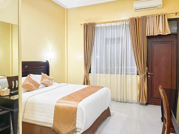 Kartika Hotel Syariah Pacitan Mitra RedDoorz, Đặt Khách sạn Khách sạn tại Pacitan có Bãi đậu xe, Bãi đậu xe