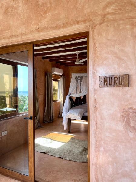 Nuru Room at Lulu Sands, Đặt  Khách sạn ở Coast Region có chỗ đỗ xe, Bãi đậu xe