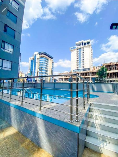 classy executive one bedroom apartment with swimming pool, fully equipped gym ample parking space and amazing scenic views, Đặt Căn hộ Nairobi Nairobi