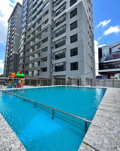 executive fully furnished three bedroom apartment in kilimani with swimming pool,fully fitted gym ,child play area ,high speed WIfi and other modern facilities to give you comfort and luxury, Đặt Căn hộ Nairobi Nairobi